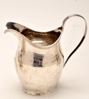 Lot 747 - A George III silver cream jug, maker's marks...