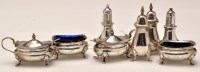 Lot 749 - A matched Edwardian silver six-piece condiment...