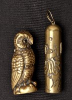 Lot 781 - A brass vesta case, in the form of an owl with...