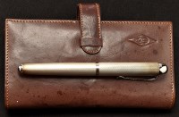 Lot 808 - A silver cased fountain pen, with engine...