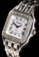 Lot 816 - A lady's 14k white gold Geneve quartz...