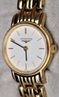 Lot 849 - Longines: a lady's Presence bracelet watch,...