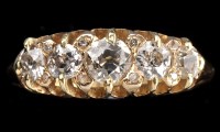 Lot 860 - A five stone diamond ring, the graduated...