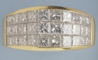 Lot 865 - A diamond dress ring, set with three rows of...