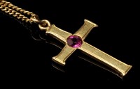 Lot 890A - A ruby and yellow metal crucifix pattern...