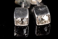 Lot 894 - A pair of diamond stud earrings, the old cut...