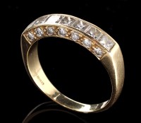 Lot 896 - A diamond ring, set with seven princess cut...