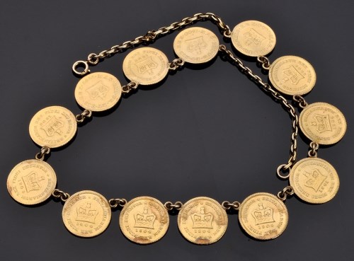 Lot 903 - A George III third-guinea necklace, solder...