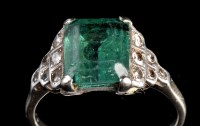 Lot 911 - An Art Deco emerald and diamond ring, the...