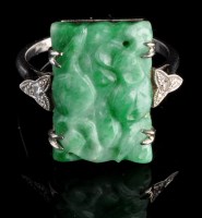 Lot 912 - An early 20th Century Chinese carved jade and...