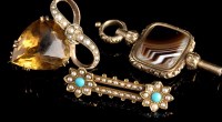 Lot 913 - An Edwardian citrine and seed pearl brooch,...