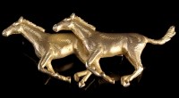 Lot 921 - A 9ct. yellow gold brooch of two galloping...