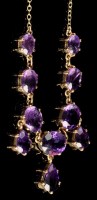 Lot 925 - An Edwardian style amethyst fringe necklace,...