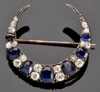 Lot 929 - A Victorian sapphire and diamond crescent...