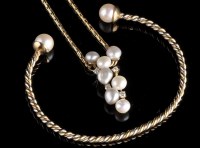 Lot 932 - A baroque pearl and diamond drop necklace, set...