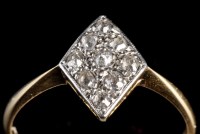 Lot 934 - A diamond ring, the diamond-shaped plaque set...