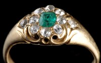 Lot 944 - A Victorian emerald and diamond cluster ring,...