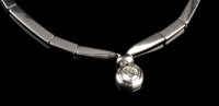 Lot 951 - A diamond necklace, the single brilliant cut...