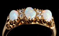 Lot 959 - A late Victorian opal and diamond ring, the...