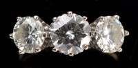 Lot 960 - A three-stone diamond ring, set three...