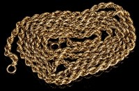 Lot 981 - A 9ct. yellow gold chain necklace, of twist...