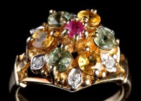 Lot 989 - A ruby, yellow stone, peridot and diamond...