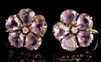 Lot 990 - A pair of amethyst and diamond earrings, each...