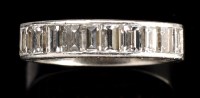 Lot 992 - A diamond ring, the ten baguette cut diamonds...