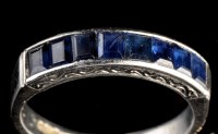 Lot 994 - A sapphire ring, set with eight rectangular...