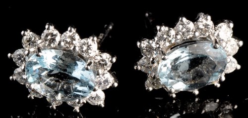 Lot 1005 - A pair of aquamarine and diamond cluster...