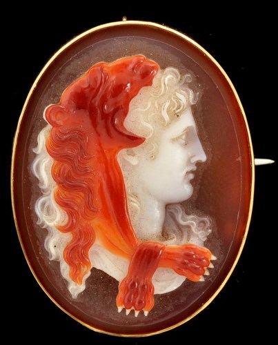 Lot 1011 - A 19th Century carved hardstone (banded agate)...