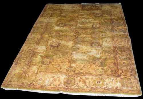 Lot 1016 - A modern Ziegler rug, on gold ground, 362 x...