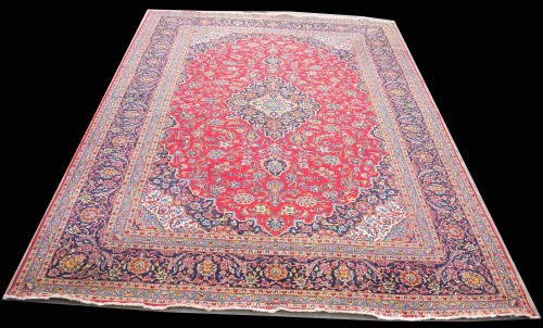 Lot 1034 - A Kashan carpet, the central diamond-shaped...