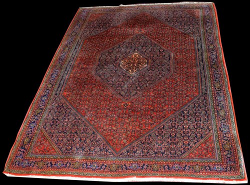 Lot 1036 - A Persian style carpet, of Shiraz type design,...