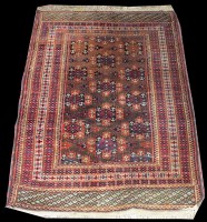 Lot 1046 - A Turkoman rug, with diamond-shaped medallions...