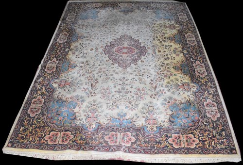 Lot 1048 - A Nain carpet, the central rosette on blue...