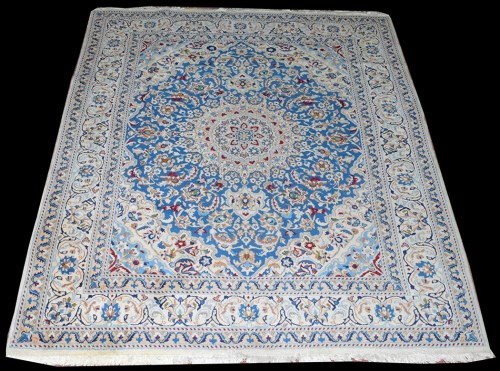 Lot 1049 - An Indian Persian style carpet, the central...