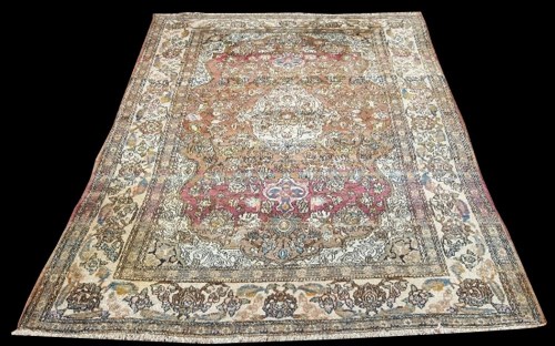 Lot 1051 - An early 19th Century Isfahan rug, the shaped...