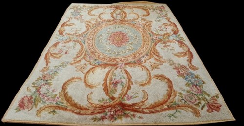 Lot 1057 - An Aubusson carpet, with central rosette...