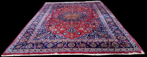 Lot 1064 - A Mashad carpet, with central rosette...