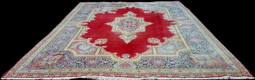 Lot 1066 - A Kirman carpet, the central foliate medallion...