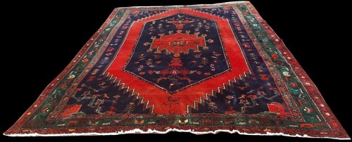 Lot 1068 - A Kurdish carpet, with geometric design and...