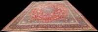 Lot 1070 - A Kashan carpet, the central rosette medallion...