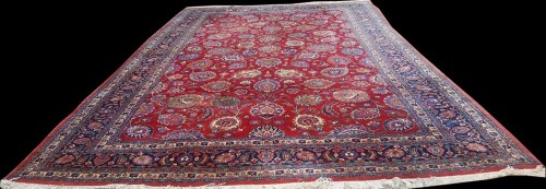 Lot 1072 - A Tabriz carpet, with bold floral motifs on...