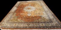 Lot 1073 - A Tabriz carpet, the central rosette medallion...