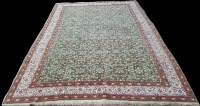 Lot 1075 - A Kayseri carpet, the green ground with...