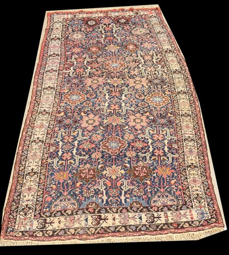Lot 1076 - A Caucasian carpet, decorated with bold floral...