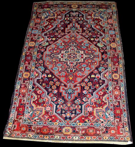 Lot 1090 - A Jozan rug, with geometric flowerhead motifs...
