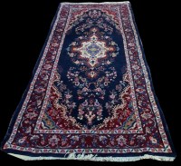 Lot 1091 - A Mehraban runner, with floral medallion and...
