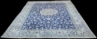 Lot 1092 - A Nain carpet, the central rosette surrounded...